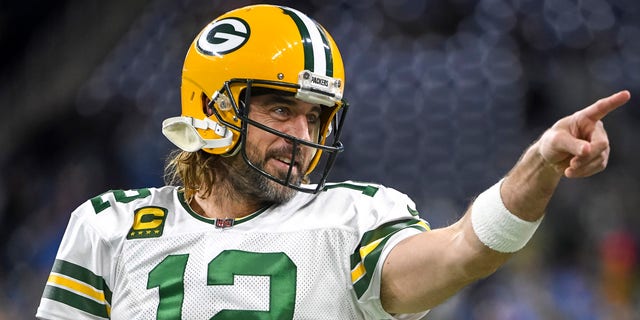 Aaron Rodgers #12 of the Green Bay Packers warms up before the game against the Detroit Lions at Ford Field on January 09, 2022 in Detroit, Michigan. 