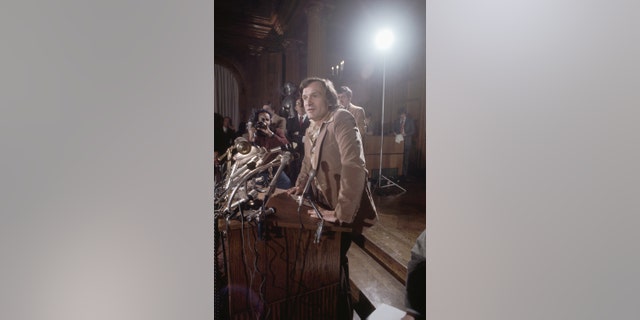 Playboy Magazine publisher Hugh Hefner at a news conference in connection with the death of his executive secretary Bobbie Arnstein, who committed suicide. 