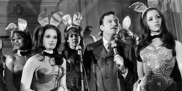 An open house reception for new girls from the Chicago area at the Playboy mansion in Chicago Feb. 8, 1969. Hugh Hefner takes to the microphone to confront young women from a female-rights group whose members said they resent being cast in the role of "lapdogs" and "servants." "I'm the guy who invented it all," Hefner admitted. 