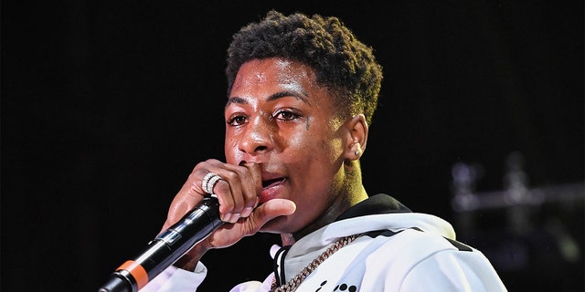 FILE – NBA YoungBoy performs during Lil WeezyAna at Champions Square on August 25, 2018, in New Orleans, Louisiana. 