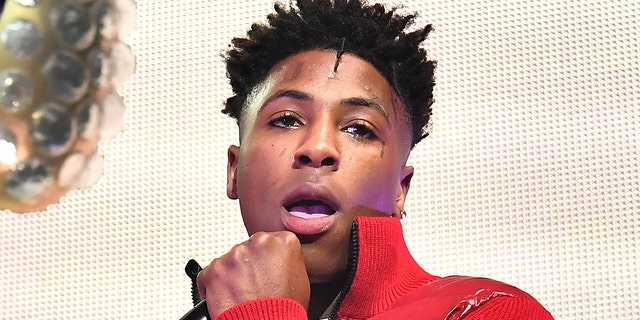 FILE – Rapper NBA YoungBoy performs onstage during Lil Baby &amp; Friends concert to promote the new release of Lil Baby's new album "Street Gossip" at Coca-Cola Roxy on November 29, 2018 in Atlanta, Georgia.  