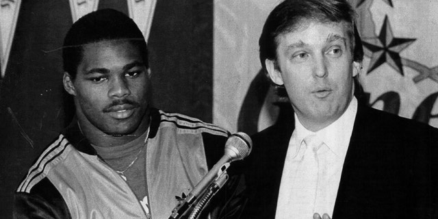 Team Owner Donald Trump announces he has signed Herschel Walker to play running back for the New Jersey Generals in New Jersey. Walker played for the General form 1983-85.