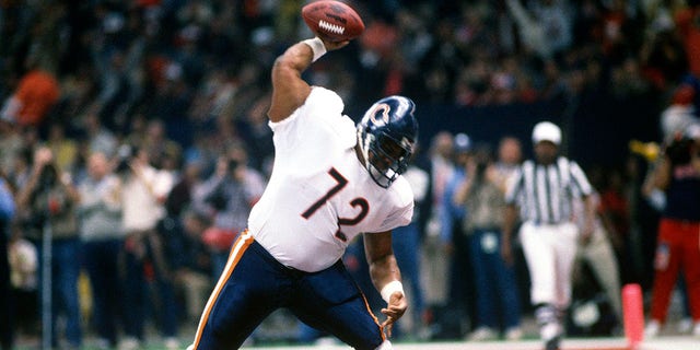  William Perry #72 celebrates after scoring a touchdown against the New England Patriots during Super Bowl XX at the Louisiana Superdome Jan. 26, 1986, in New Orleans, Louisiana. The Bears won the Super Bowl 46-10.