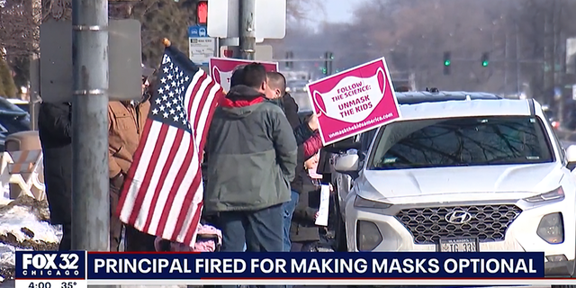 Parents and students rally in support of principal who was place on leave for making masks optional.