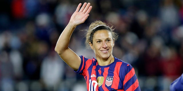 United States forward Carli Lloyd waves to fans after a soccer friendly match against South Korea, Tuesday, Oct. 26, 2021, in St. Paul, Minnesota.