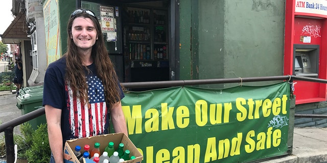 Conservative activist Scott Presler organized his first community cleanup in Baltimore after President Trump called it a "disgusting, rat and rodent infested mess." 