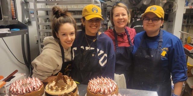 Anna Afanasieva, left, opened Laika Cheesecakes and Espresso in San Antonio, Texas, in December 2020. She's pictured here with her team at work. She said of her Ukrainian family, "At least I know that now they're safe." 