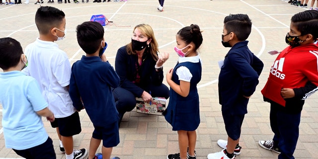 Long Beach Unified School District Superintendent Jill Baker talks to first-graders at Roosevelt Elementary School in Long Beach on Aug. 31, 2021. (Brittany Murray/MediaNews Group/Long Beach Press-Telegram via Getty Images)