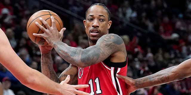 Bulls forward DeMar DeRozan looks to pass against the Los Angeles Clippers in Chicago, Thursday, March 31, 2022.