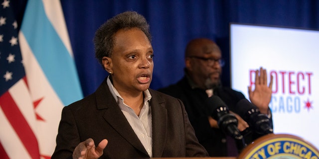  Chicago Mayor Lori Lightfoot speaks during a press conference at City Hall, Tuesday, Dec. 21, 2021, in Chicago.