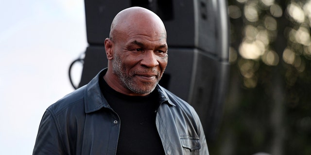 Former professional boxer Mike Tyson attends Celebration of Smiles Event hosted by Dionne Warwick on her 81st Birthday to benefit medical charity organization, Operation Smile and The Kind Music Academy on Dec. 12, 2021 in Malibu, California. 