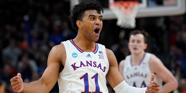 Kansas' Remy Martin reacts during the Elite 8 round of the NCAA tournament March 27, 2022, in Chicago. 