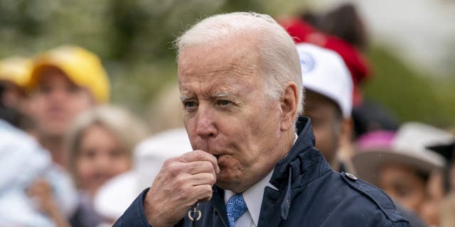President Joe Biden blows his whistle for the start of a race during the White House Easter Egg Roll, Monday, April 18, 2022, in Washington. (AP Photo/Andrew Harnik)