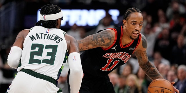Chicago Bulls' DeMar DeRozan drives past Milwaukee Bucks' Wesley Matthews during the second half of Game 2 of their first round NBA playoff basketball game Wednesday, April 20, 2022, in Milwaukee. The Bulls won 114-110 to tie the series at 1-1. 