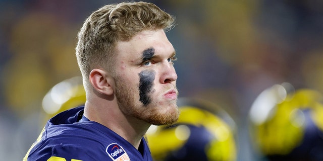 Michigan Wolverines defensive end Aidan Hutchinson (97) during the Capital One Orange Bowl game between the Georgia Bulldogs and the Michigan Wolverines on December 31, 2021 at Hard Rock Stadium in Miami Gardens, FL.