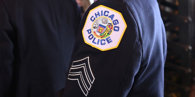 The 23-year-old Chicago police officer was treated at a hospital for an injury to his leg, according to police and local reports.
