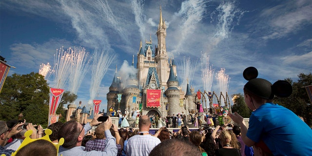 Fireworks go off around Cinderella's castle