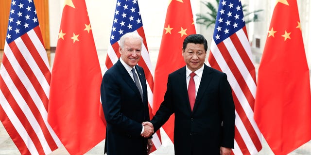 Chinese President Xi Jinping and President Biden. (Photo by Lintao Zhang/Getty Images)