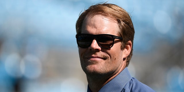 Former player Greg Olsen watches the Carolina Panthers-Philadelphia Eagles game at Bank of America Stadium on Oct. 10, 2021, in Charlotte, North Carolina.