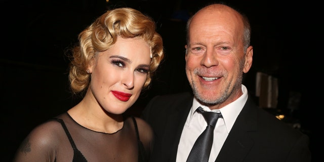 Rumer Willis and father Bruce Willis pose backstage as Rumer makes her broadway debut as "Roxie Hart" in Broadway's "Chicago" on Broadway at The Ambassador Theater on September 21, 2015 in New York City.  
