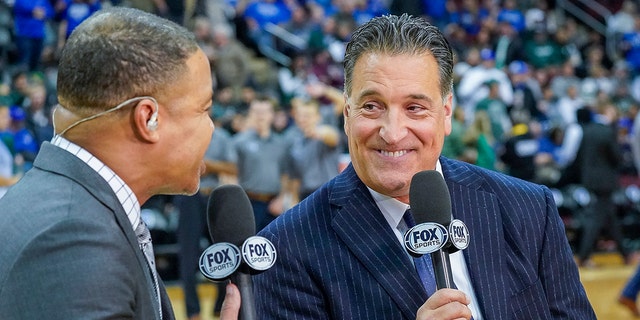 Fox Sports host Mike Hill, left, with analyst Steve Lavin before a game between the Seton Hall Pirates and the Michigan State Spartans at Prudential Center Nov. 14, 2019, in Newark, N.J.