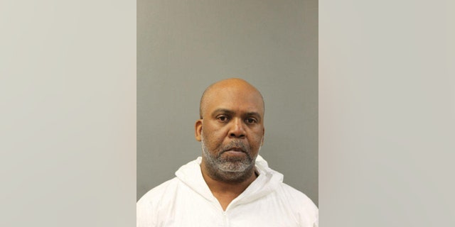 Alphonso Hamilton, 50, turned himself in to the Schiller Park Police Department, where he was charged with fatally shooting his wife, Jennifer Hamilton. (Chicago Police)