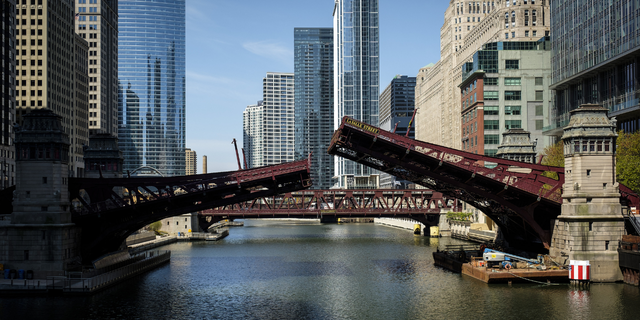 The Lasalle Street Bridge is raised over the Chicago River in Chicago, Illinois, U.S., on Thursday, May 7, 2020.