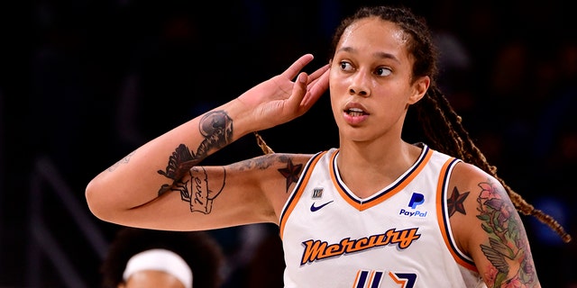 Brittney Griner of the Phoenix Mercury celebrates during Game Four of the 2021 WNBA Finals on Oct. 17, 2021, at the Wintrust Arena in Chicago, Illinois.