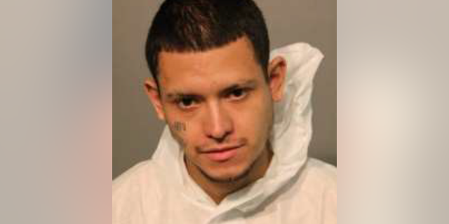 Joseph Guardia, 27, allegedly poured flammable liquid on him and ignited it, according to FOX 32 Chicago.