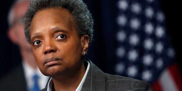 Chicago Mayor Lori Lightfoot continued to defend her controversial decision to only speak with non-White reporters.  (AP Photo/Charles Rex Arbogast, File) 