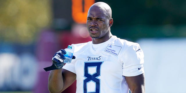 Tennessee Titans running back Adrian Peterson warms up during an NFL football practice Friday, Nov. 5, 2021, in Nashville, Tenn. 