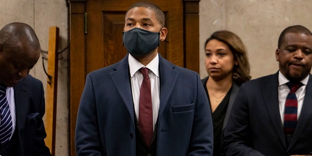 Actor Jussie Smollett appears with his attorneys at his sentencing hearing at the Leighton Criminal Court Building, Thursday, March 10, 2022, in Chicago.
