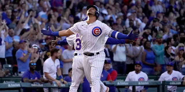 Chicago Cubs' Willson Contreras celebrates his grand slam off Pittsburgh Pirates relief pitcher Bryse Wilson during the first inning of a baseball game Monday, May 16, 2022, in Chicago. 