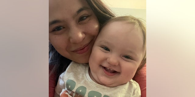 Allie Seckel is a certified infant feeding technician and a formula feeding consultant who spoke to Fox News Digital about the baby formula shortage. She's pictured here with her 10-month-old daughter.