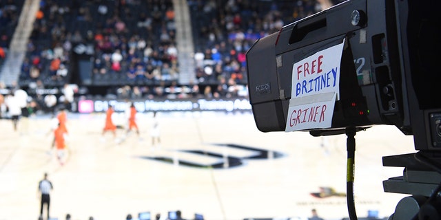  A sign reading "Free Brittney Griner" is seen on a television camera during the championship game of the Big West Conference basketball tournament between the Cal State Fullerton Titans and the Long Beach State 49ers at Dollar Loan Center on March 12, 2022 in Henderson, Nevada.
