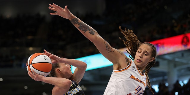 Courtney Vandersloot of the Sky drives to the basket against Brittney Griner of the Phoenix Mercury at Wintrust Arena on Oct. 17, 2021, in Chicago, Illinois.