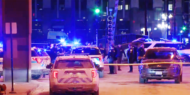Chicago police attempted to pull over a carjacked vehicle on Monday night and traded gunfire with the suspects, shooting one and taking two others into custody.