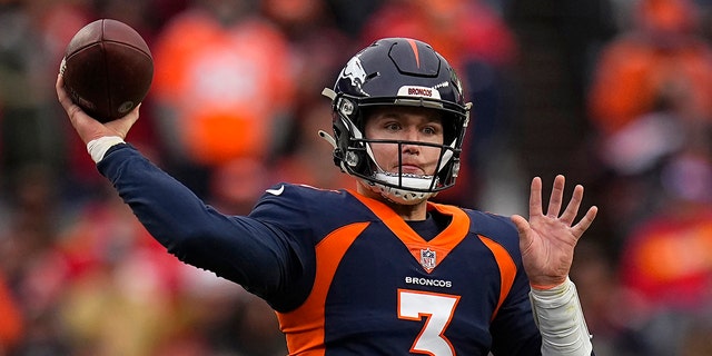 FILE - Denver Broncos quarterback Drew Lock (3) passes against the Kansas City Chiefs during the first half of an NFL football game Jan. 8, 2022, in Denver. Lock says he is relishing the chance to get a fresh start for his career following his trade to the Seattle Seahawks.