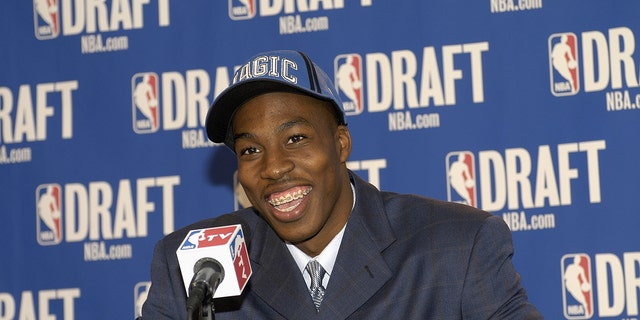 Dwight Howard of the Orlando Magic talks with the media after the 2004 NBA Draft at Madison Square Garden on June 24, 2004 in New York, New York.