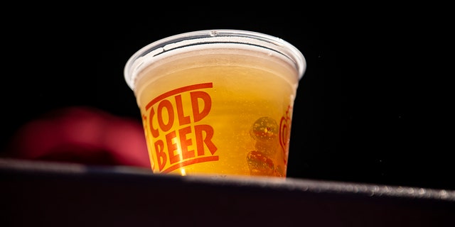 A cup of beer is displayed during a game between the Red Sox and the Baltimore Orioles on Sept. 19, 2021 at Fenway Park in Boston.