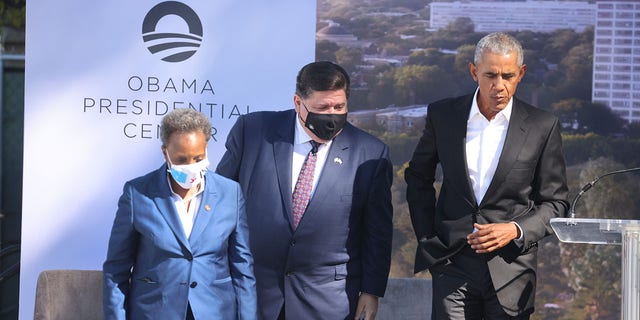 Illinois Gov. J.B. Pritzker and Chicago Mayor Lori Lightfoot join former U.S. President Barack Obama during a ceremonial groundbreaking at the Obama Presidential Center in Jackson Park on Sept. 28, 2021, in Chicago. 
