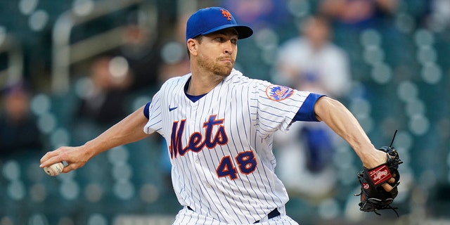 New York Mets' Jacob deGrom delivers a pitch during the first inning of a baseball game against the Colorado Rockies Tuesday, May 25, 2021, in New York.