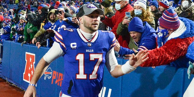 Buffalo Bills quarterback Josh Allen celebrates with fans after a game against the New York Jets Jan. 9, 2022, in Orchard Park, N.Y. 