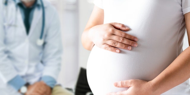 A pregnant woman visiting the doctor. (iStock)