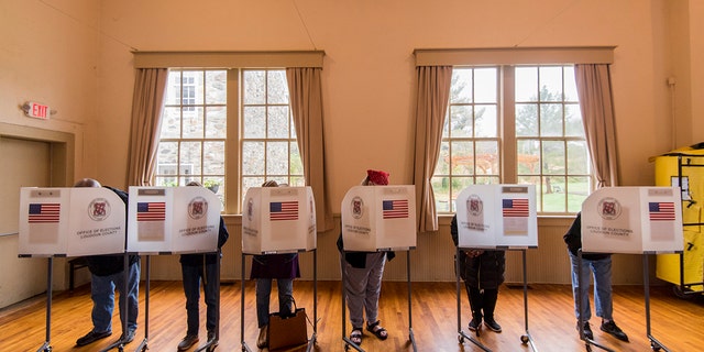 Voters fill out their ballots at the Old Stone School polling location in Hillsboro, Va., on Election Day, Nov. 6, 2018.