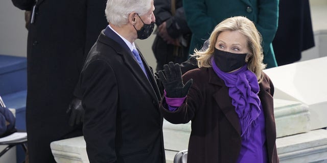 Former President Bill Clinton and former Secretary of State Hillary Clinton arrive for the 59th Presidential Inauguration at the U.S. Capitol in Washington, Wednesday, Jan. 20, 2021. 