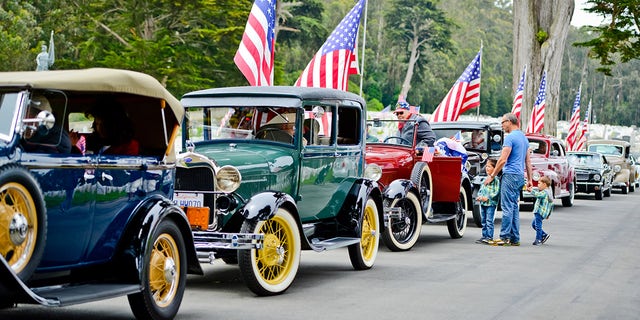 The Presidio parade features a variety of vehicles, from the Depression-era Ford Model A to the 1960s Ford Mustang.