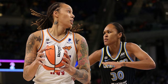 Brittney Griner #42 of the Phoenix Mercury is defended by Azurá Stevens #30 of the Chicago Sky during the first half of Game Four of the WNBA Finals at Wintrust Arena on October 17, 2021 in Chicago, Illinois. 