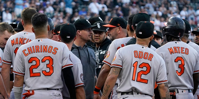 Players from the Baltimore Orioles and Chicago White Sox exchange words after Jorge Mateo of the Baltimore Orioles was hit by a pitch from Chicago White Sox starter Michael Kopech during the second inning in Chicago Friday, June 24, 2022. 