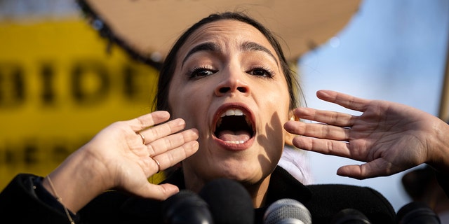 Rep. Alexandria Ocasio-Cortez, D-N.Y., speaks during a rally outside the U.S. Capitol, Dec. 7, 2021 in Washington.